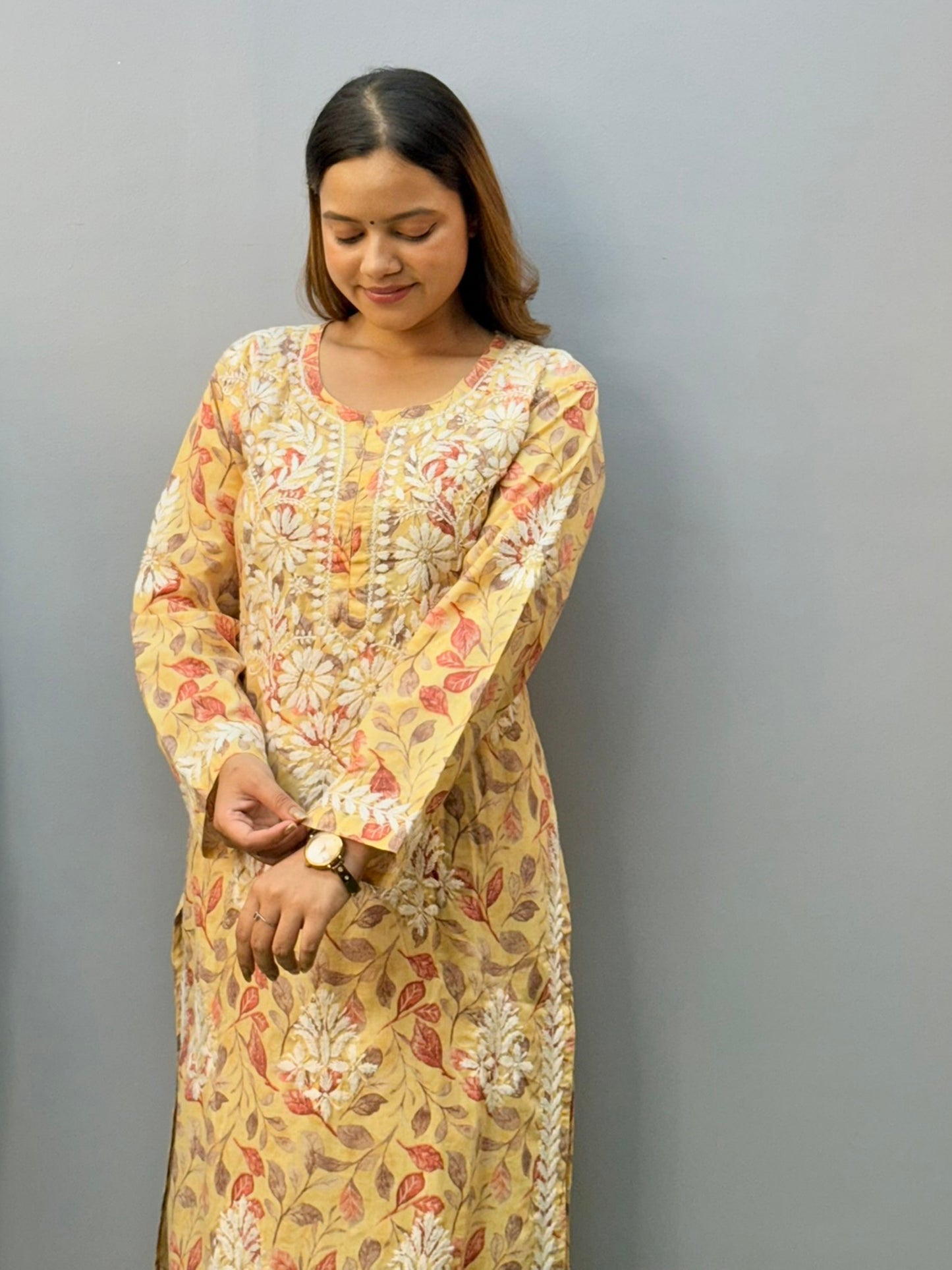 Mustard printed cotton chikankari kurta pant set with white hand embroidery and floral leaf pattern