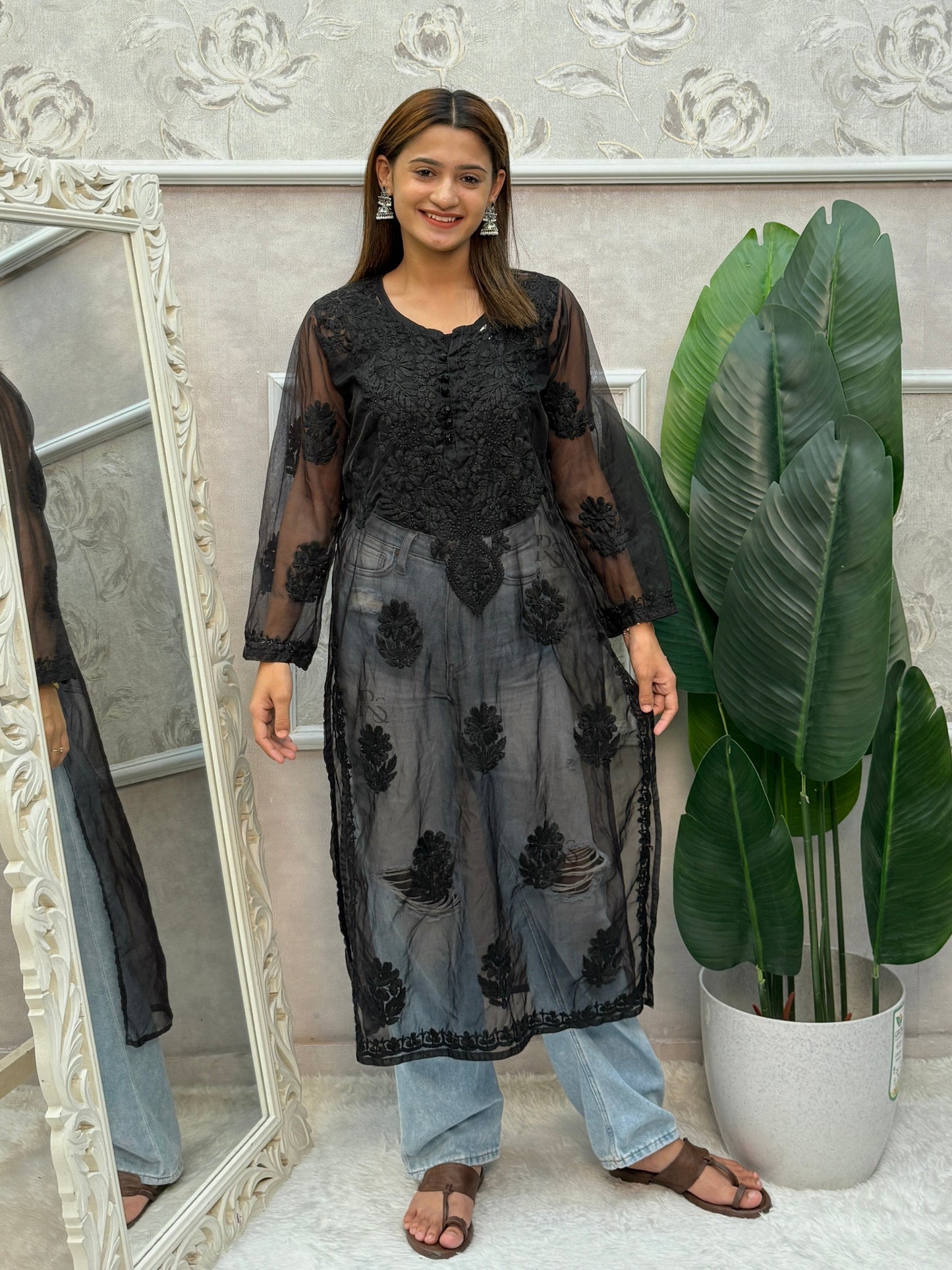 Black Lucknow Chikankari organza kurta with hand embroidery in transy fabric.