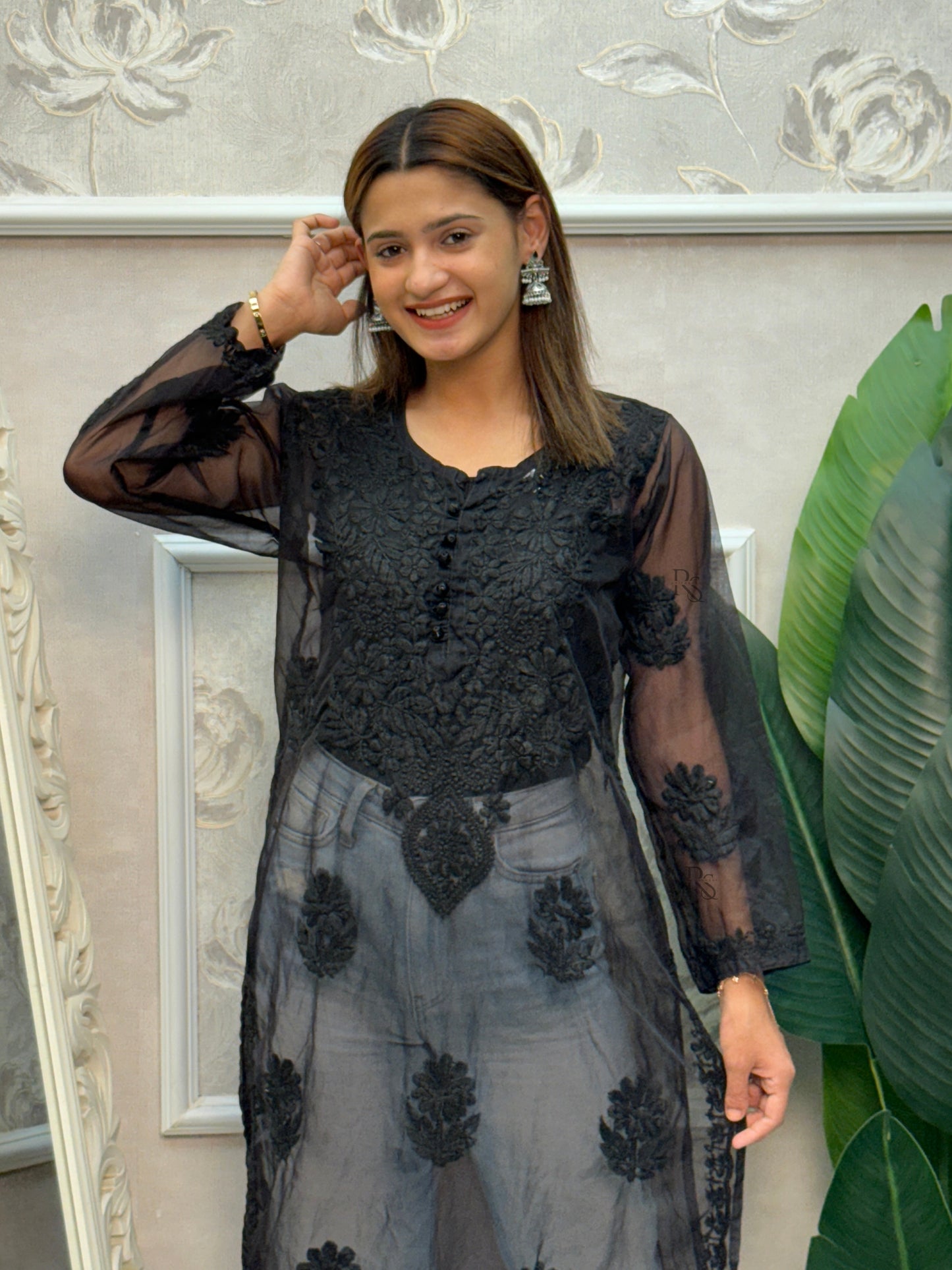 Black Lucknow Chikankari organza kurta with hand embroidery in transy fabric.