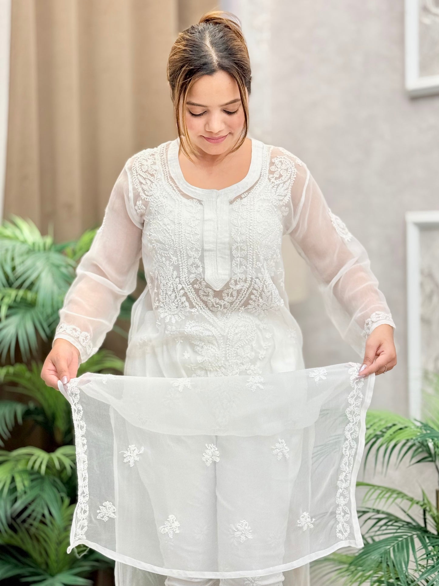 White translucent georgette chikankari kurta with hand embroidery – casual wear.