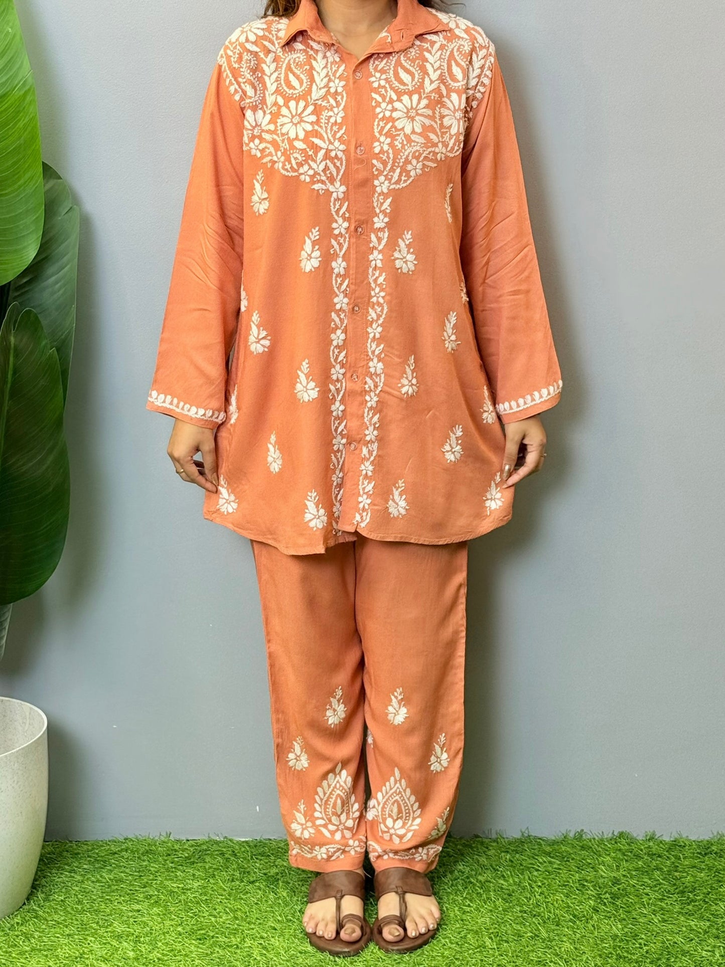 Terracotta Lucknowi chikankari short kurta and pant set in rayon fabric with white hand embroidery