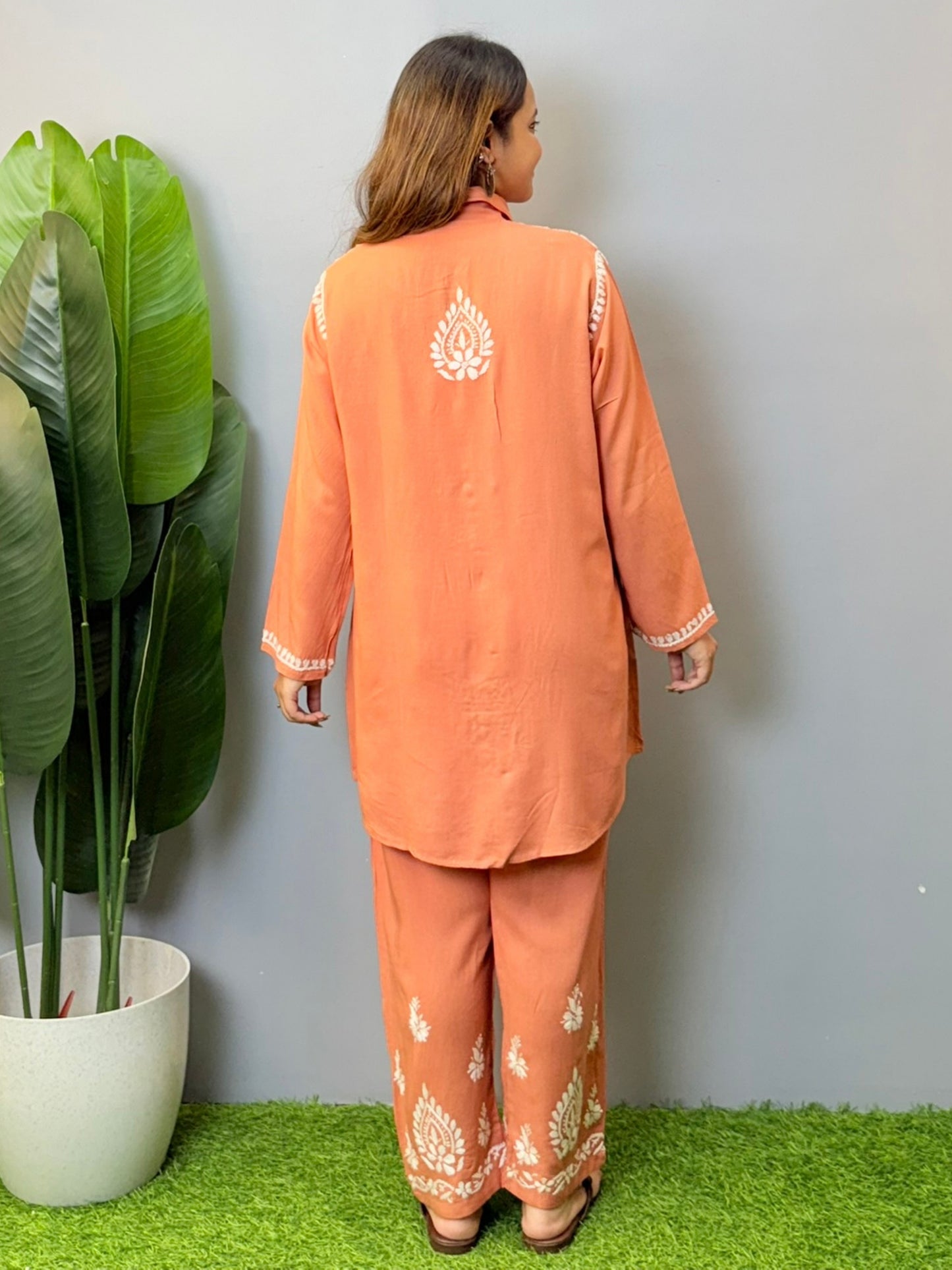 Terracotta Lucknowi chikankari short kurta and pant set in rayon fabric with white hand embroidery