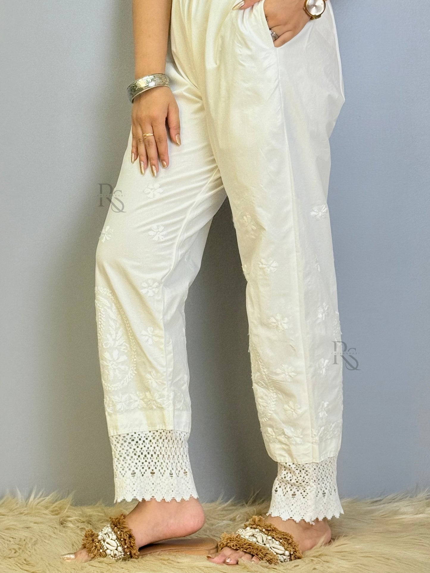 White cotton chikankari pant with lace hem and delicate hand embroidery