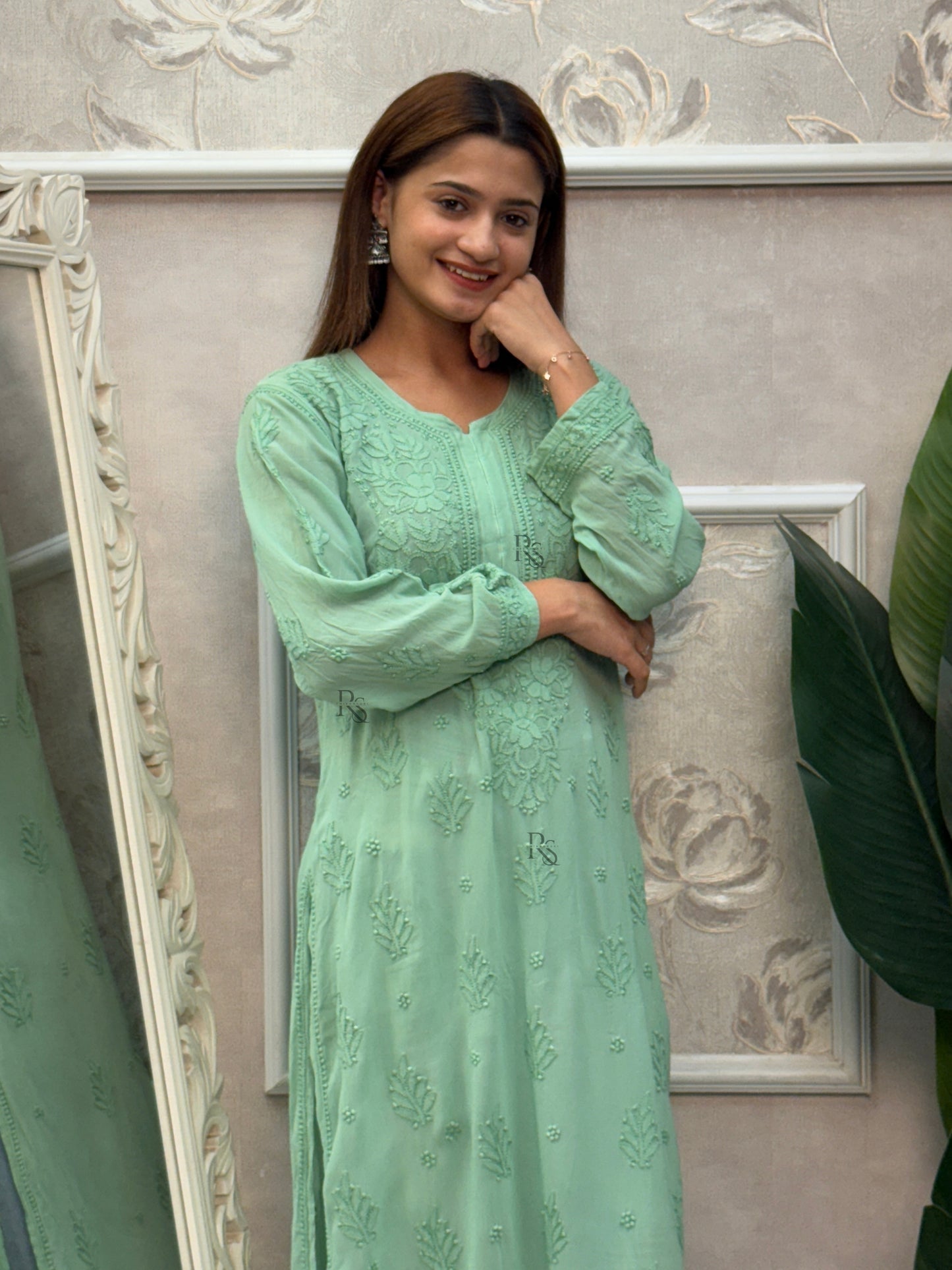 Mint green Lucknow Chikankari kurta in viscose fabric with bakhiya hand embroidery.