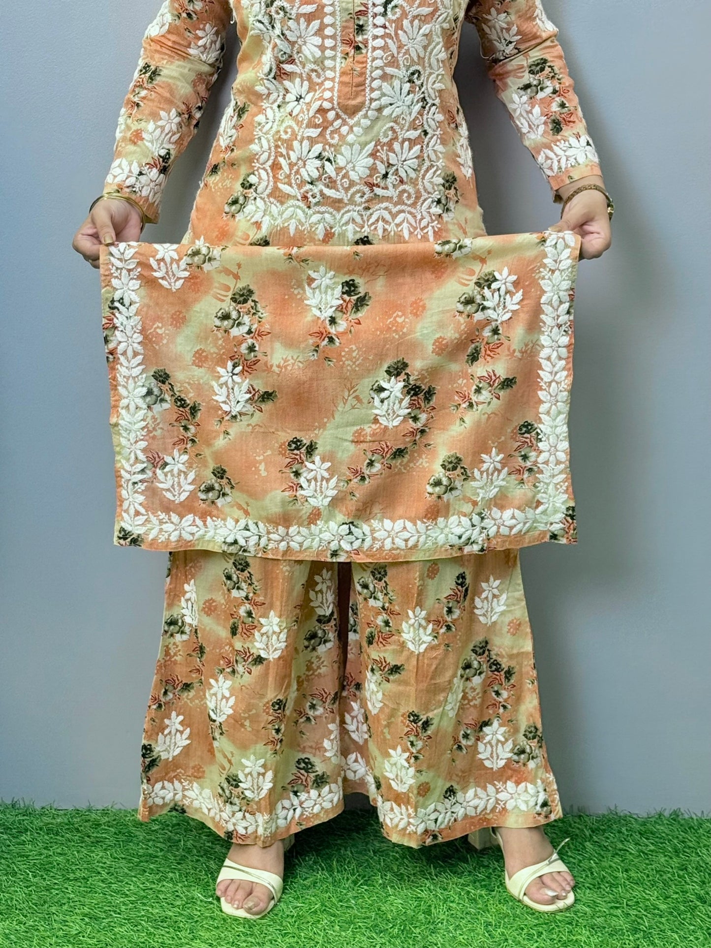 Peach floral printed mulmul chikankari kurta palazzo set with hand embroidery
