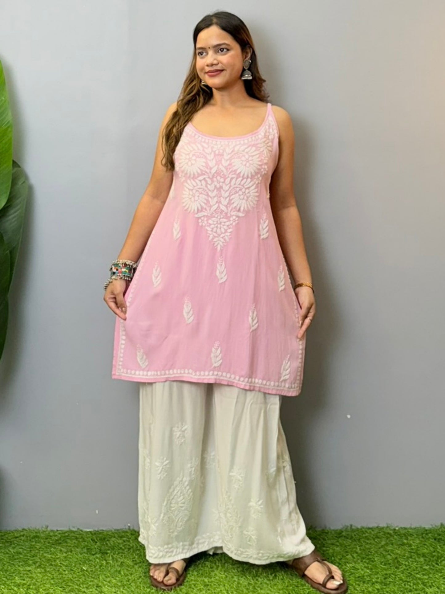 Baby pink sleeveless rayon Lucknowi Chikankari short kurta with white hand embroidery
