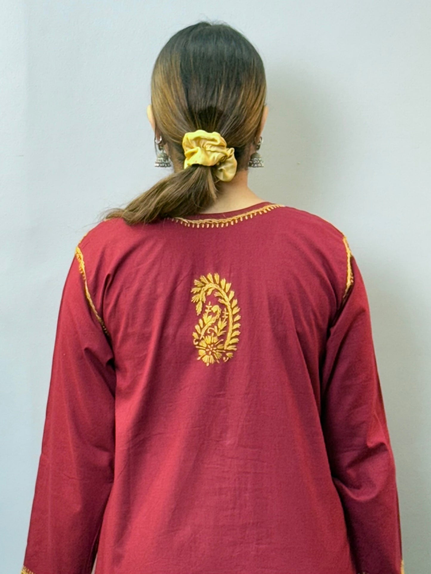 Maroon cotton Lucknowi Chikankari kurta with mustard hand embroidery for casual wear