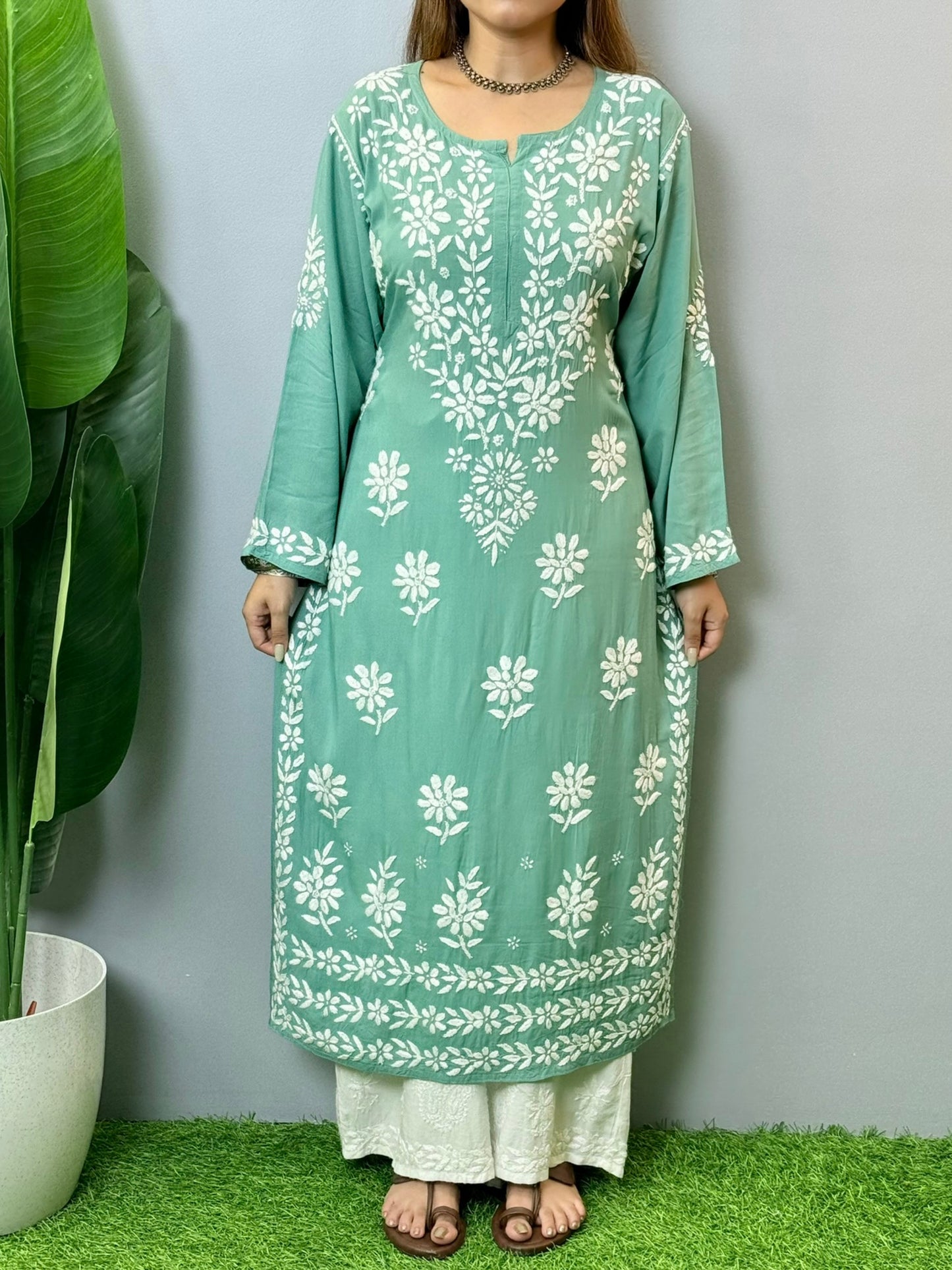 Sage green modal Chikankari kurta with white floral hand embroidery, perfect for summer wear
