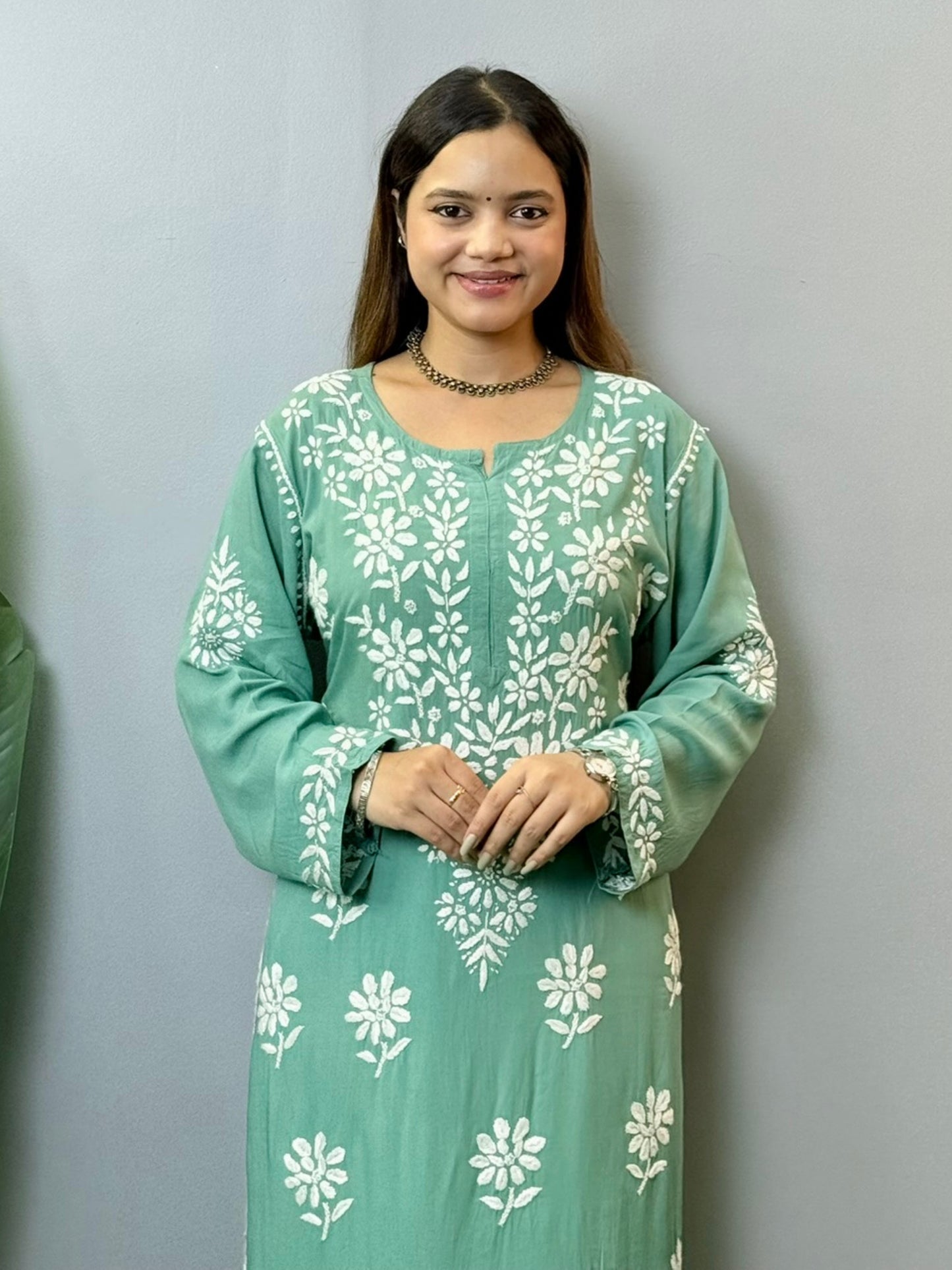 Sage green modal Chikankari kurta with white floral hand embroidery, perfect for summer wear