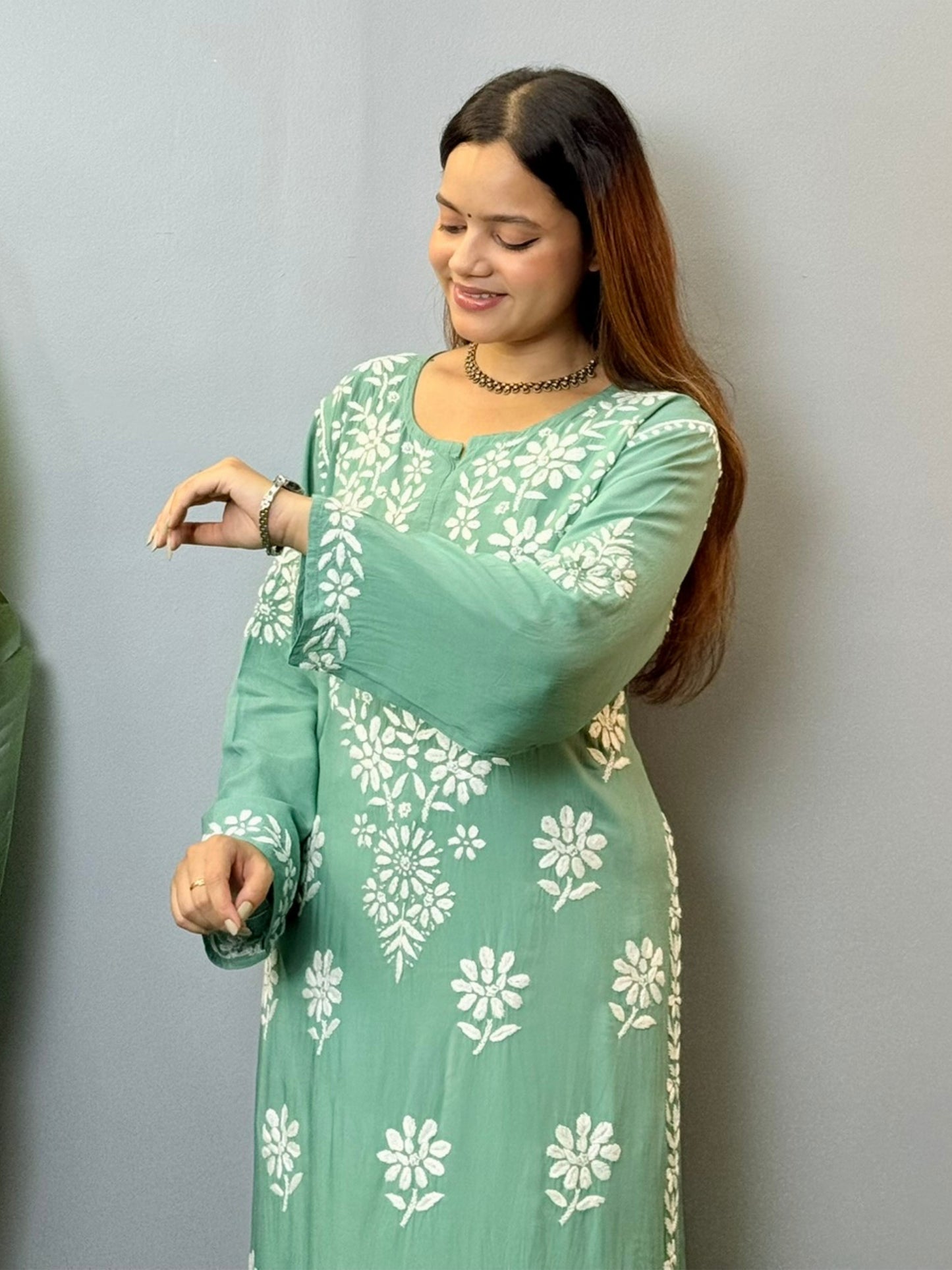 Sage green modal Chikankari kurta with white floral hand embroidery, perfect for summer wear