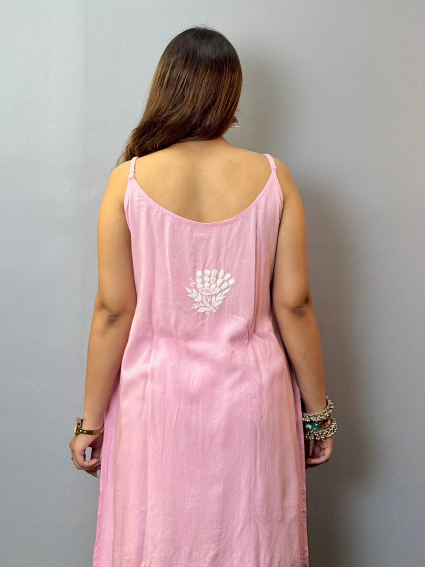 Baby pink sleeveless rayon Lucknowi Chikankari short kurta with white hand embroidery
