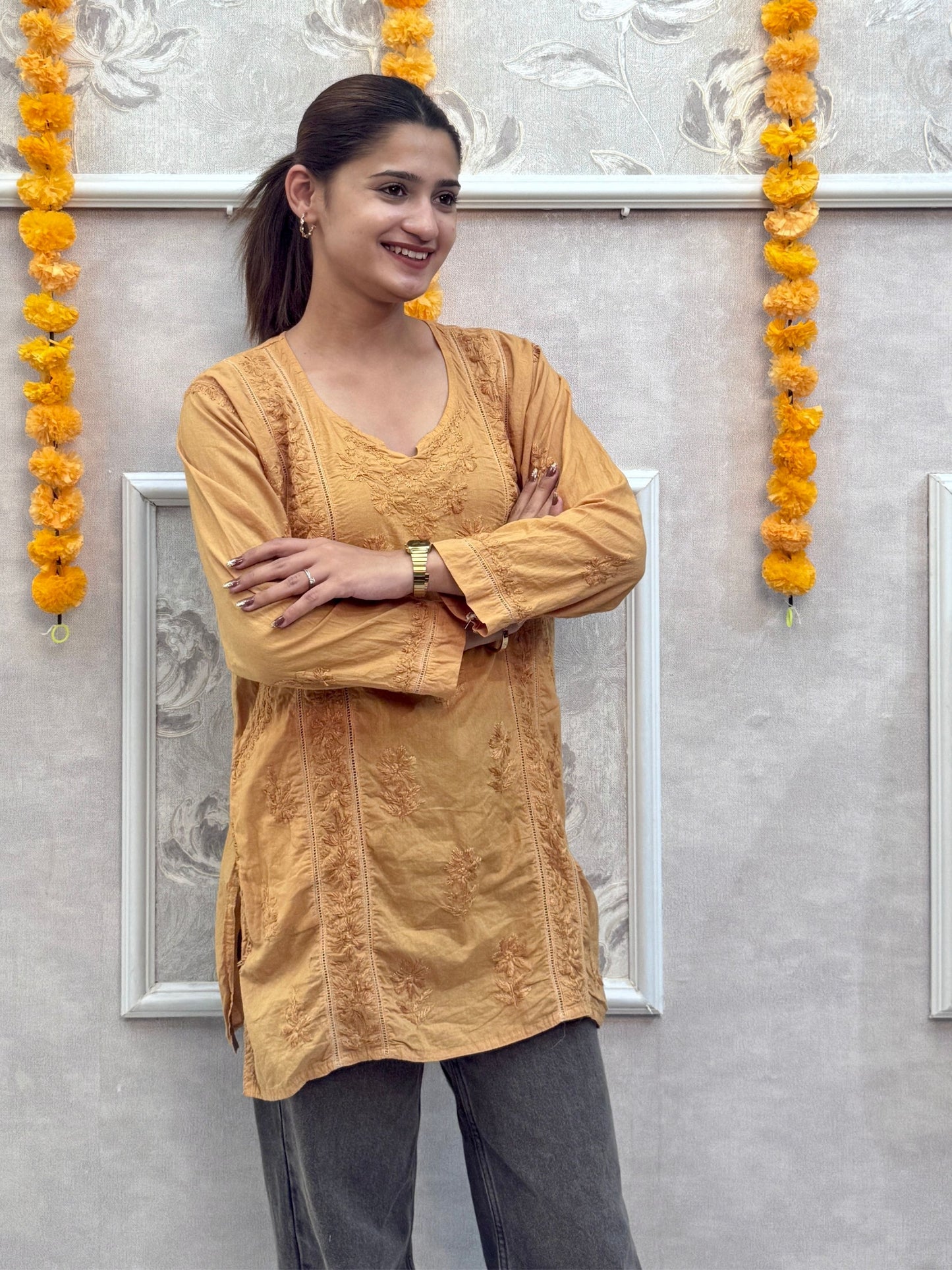 Mustard cotton short chikankari kurta with hand embroidery and both side pockets