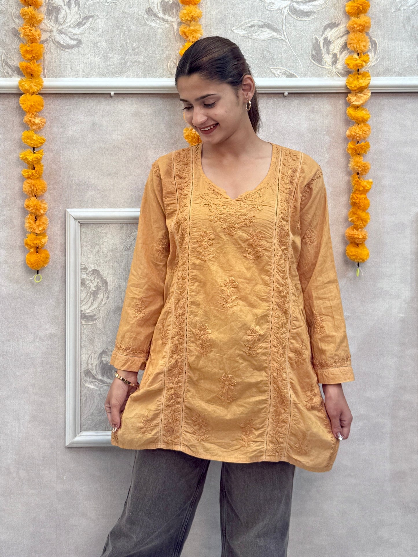 Mustard cotton short chikankari kurta with hand embroidery and both side pockets