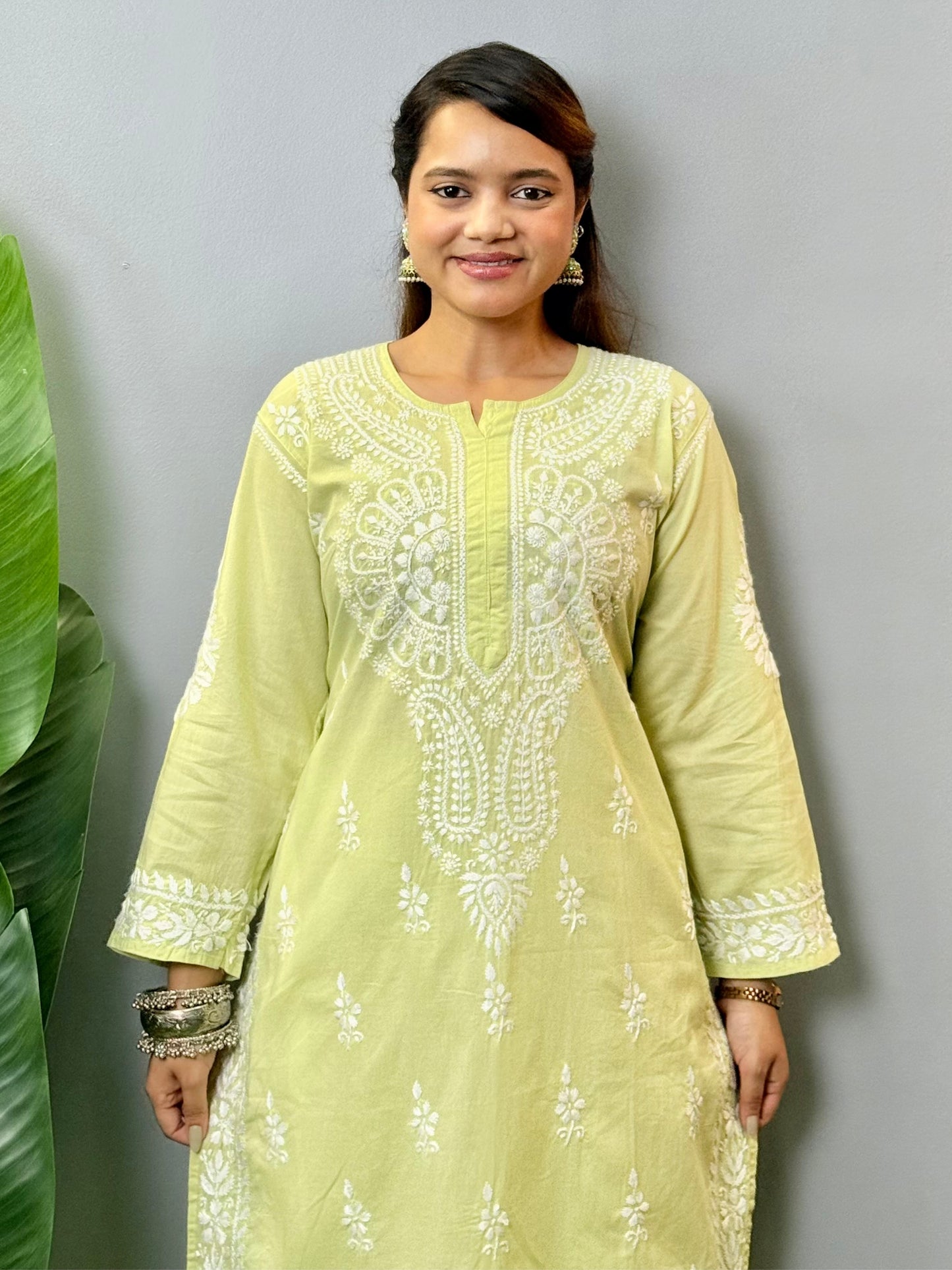 Light green cotton Lucknow Chikankari kurta and palazzo set with hand embroidery – premium quality ethnic wear.