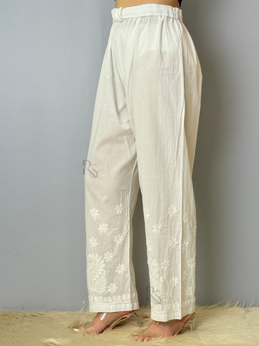 White cotton chikankari pant with intricate floral embroidery, non-stretchable and dyable