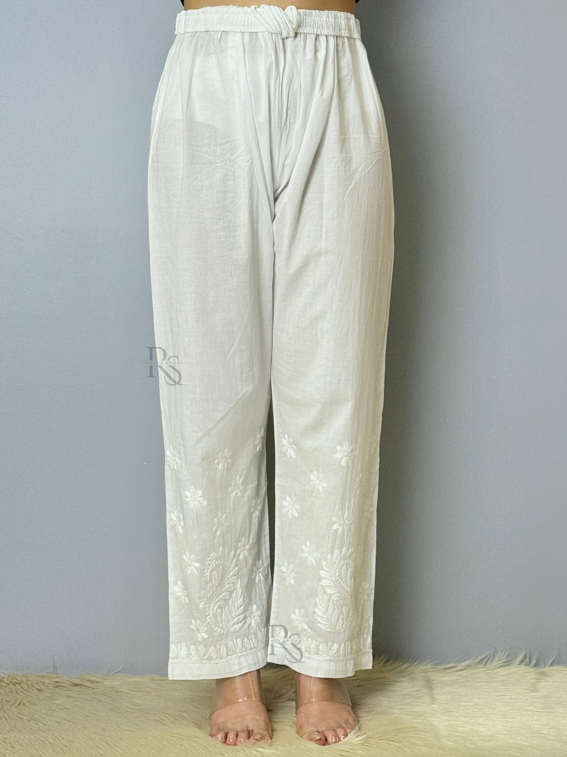 White cotton chikankari pant with intricate floral embroidery, non-stretchable and dyable