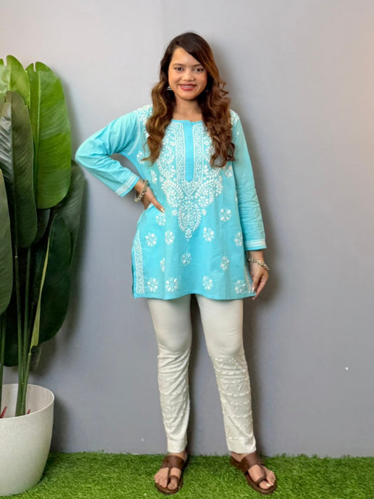 Sky blue cotton short chikankari kurta with white hand embroidery, styled for casual wear