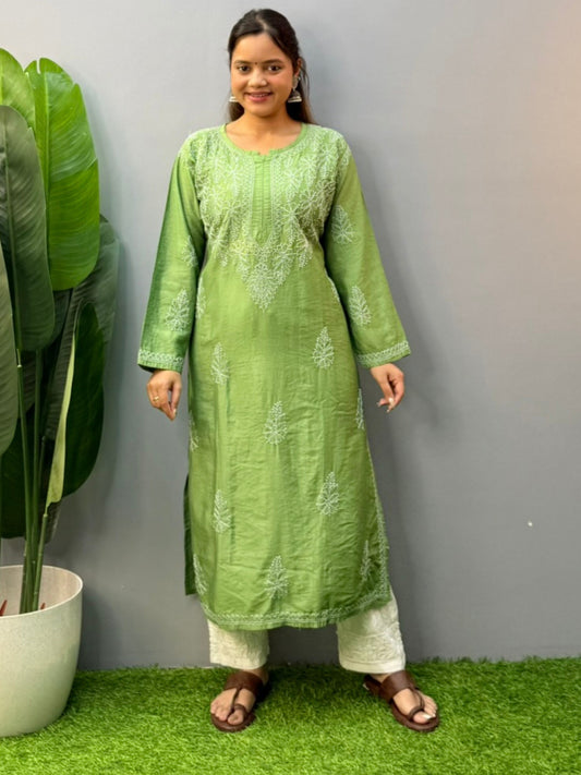 Model wearing leaf green chanderi chikankari kurta with bakhiya hand embroidery
