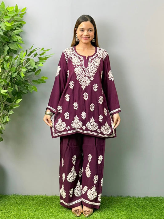 Model wearing plum wine Lucknow Chikankari short kurta and palazzo co-ord set in rayon fabric