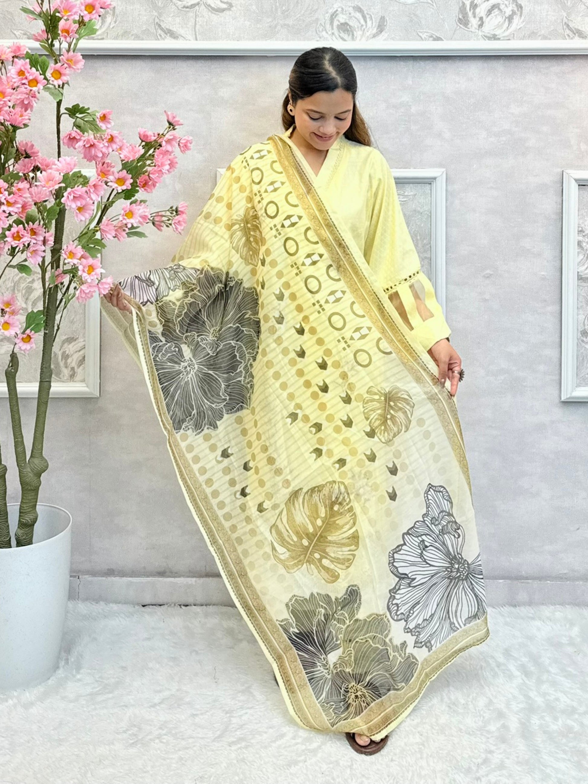 Butter yellow rayon kurta set with hand embroidery and printed floral dupatta