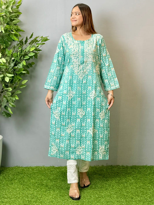 Model wearing an aqua blue printed chikankari mulmul kurta with white embroidery detailing