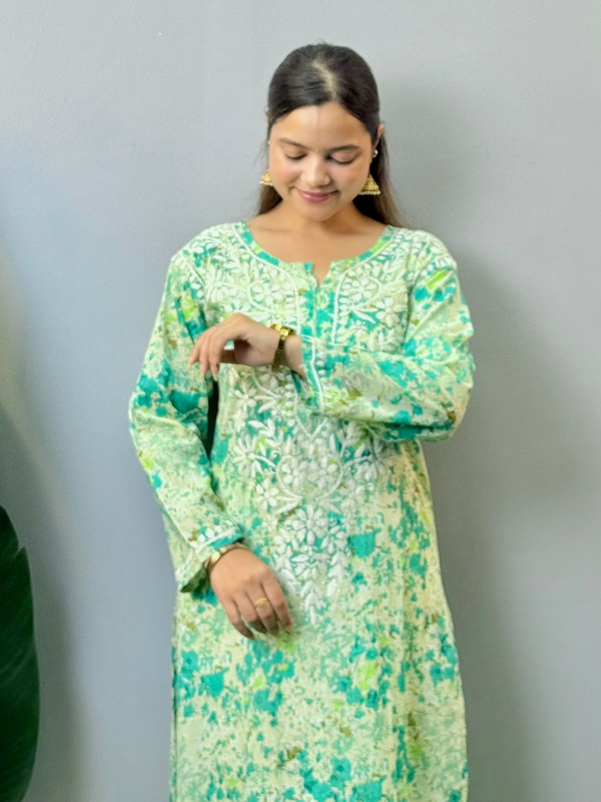 Mint green floral mulmul Chikankari kurta with white hand embroidery – soft and breathable ethnic wear for women