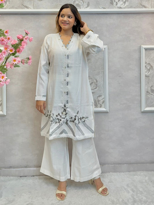 White premium rayon co-ord set featuring handwork on short kurta top with flared palazzo pants – stylish and elegant