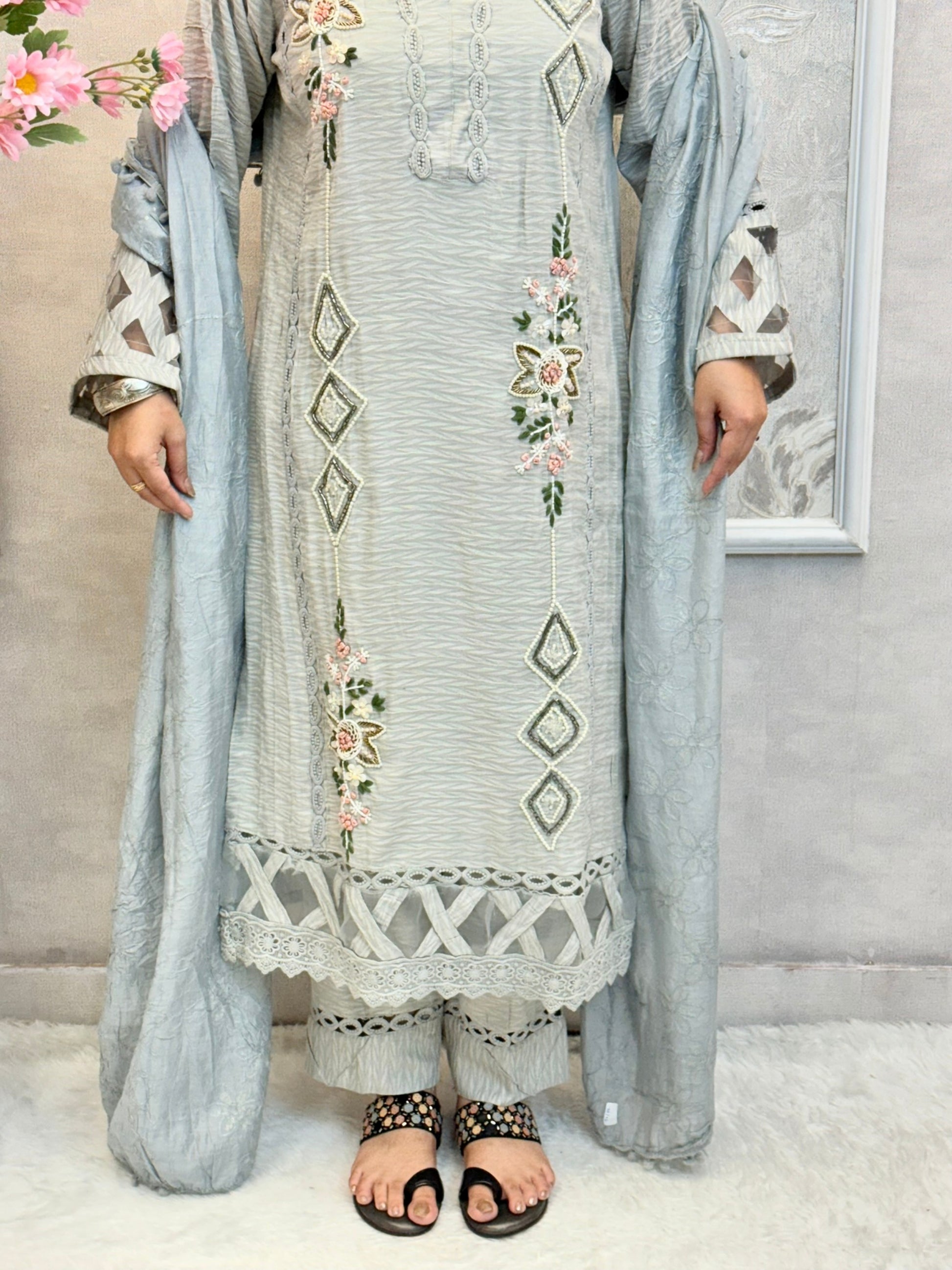 Pastel grey rayon designer suit with handwork kurta, matching pant and chanderi dupatta featuring tassel detailing – stylish and elegant look