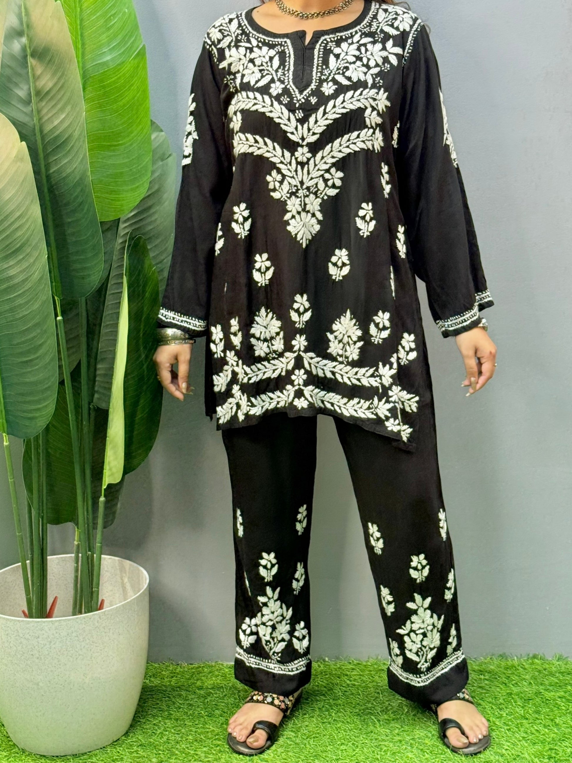 Black rayon chikankari short kurta and pant set with white hand embroidery