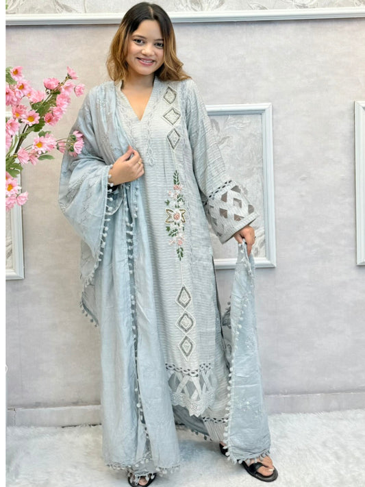 Pastel grey rayon designer suit with handwork kurta, matching pant and chanderi dupatta featuring tassel detailing – stylish and elegant look