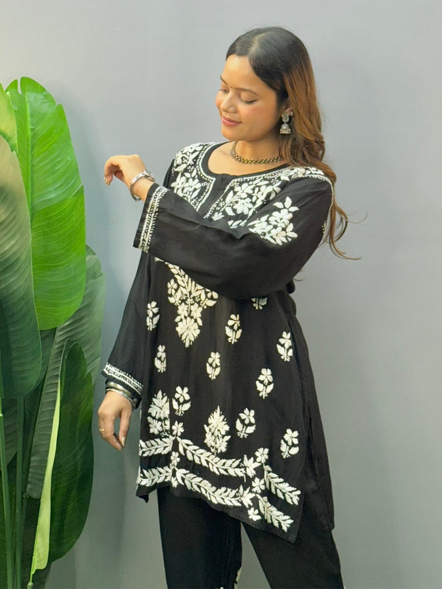 Black rayon chikankari short kurta and pant set with white hand embroidery