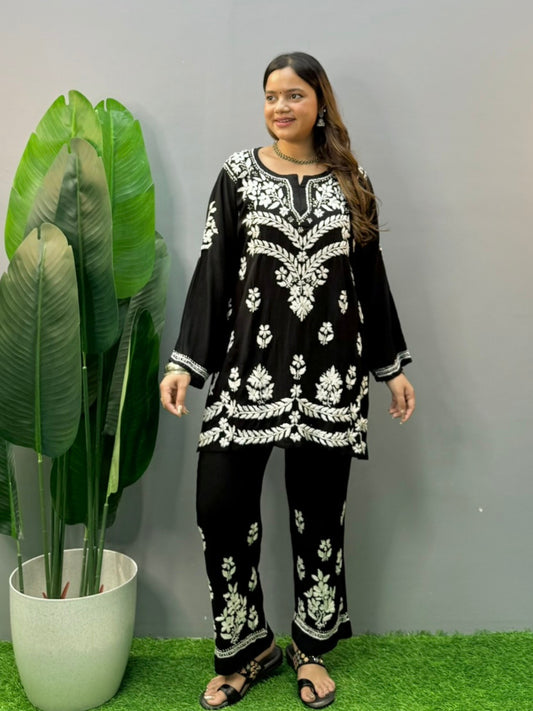 Black rayon chikankari short kurta and pant set with white hand embroidery