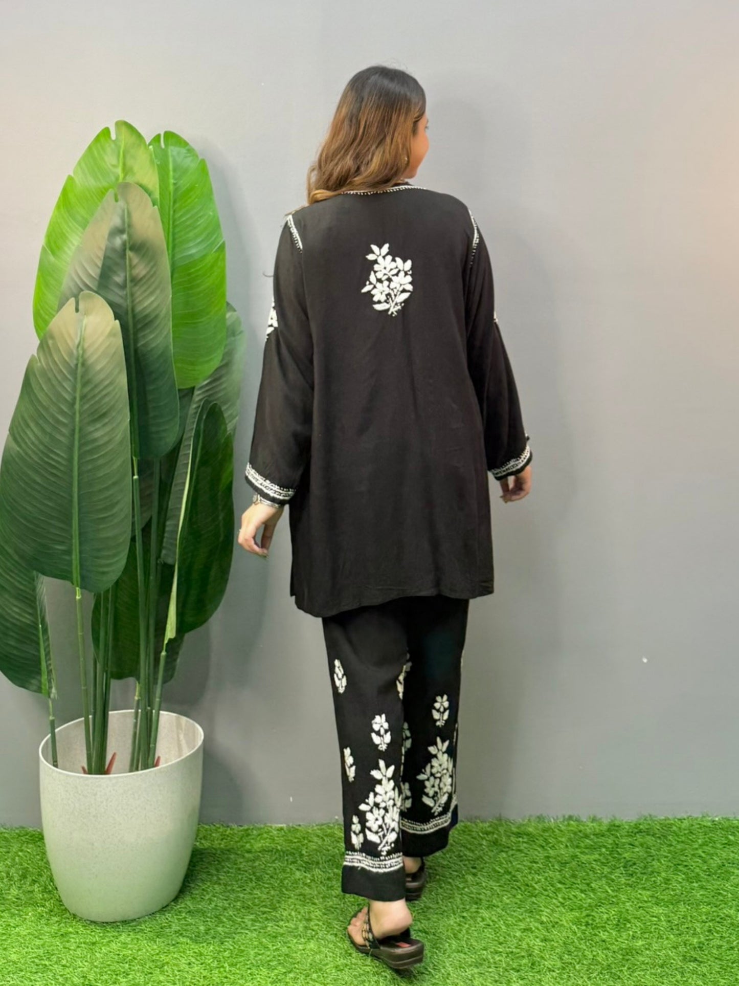 Black rayon chikankari short kurta and pant set with white hand embroidery