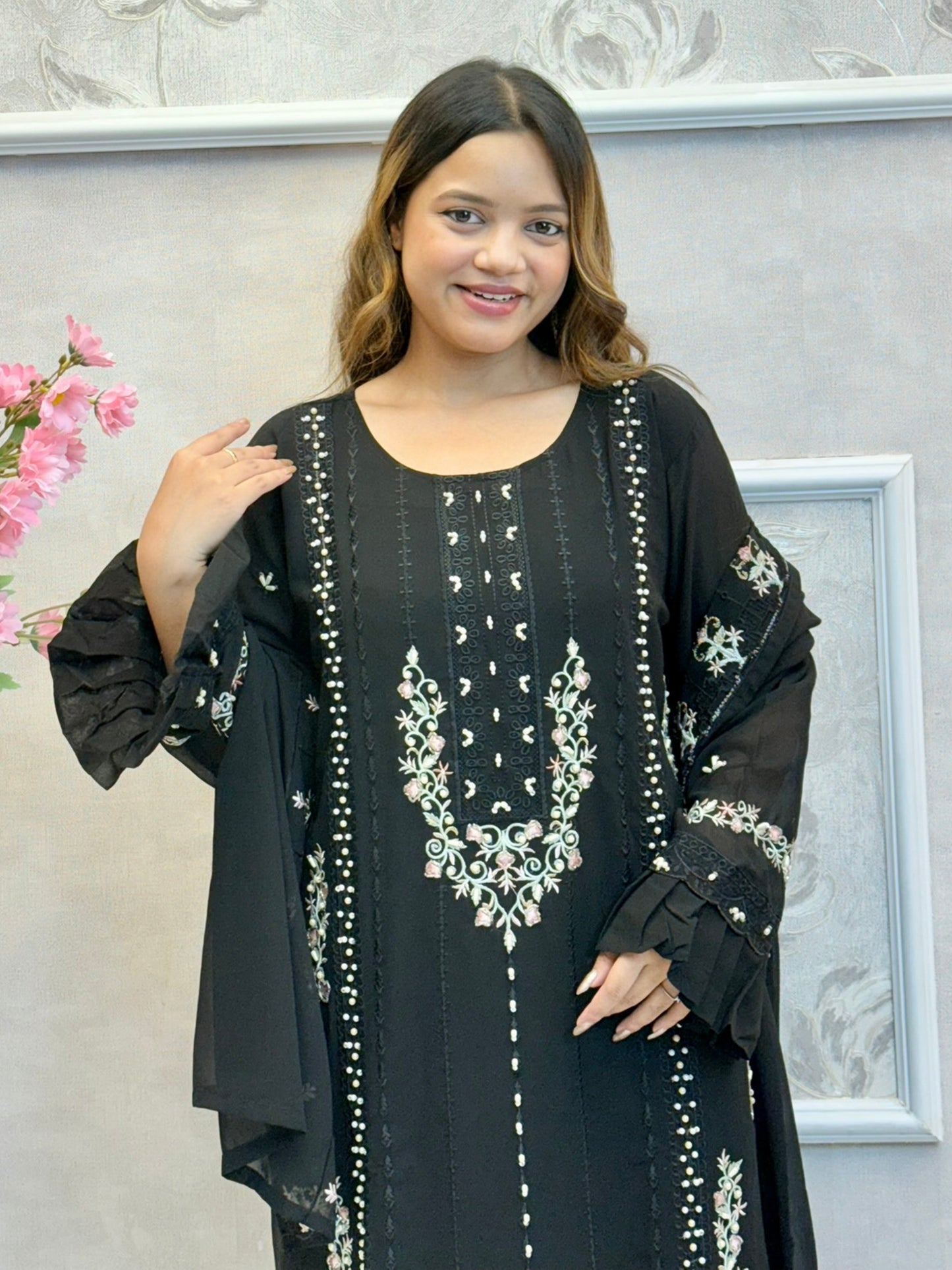 Black georgette suit with handwork detailing, satin pant, and embroidered dupatta – festive and stylish Indian ethnic outfit