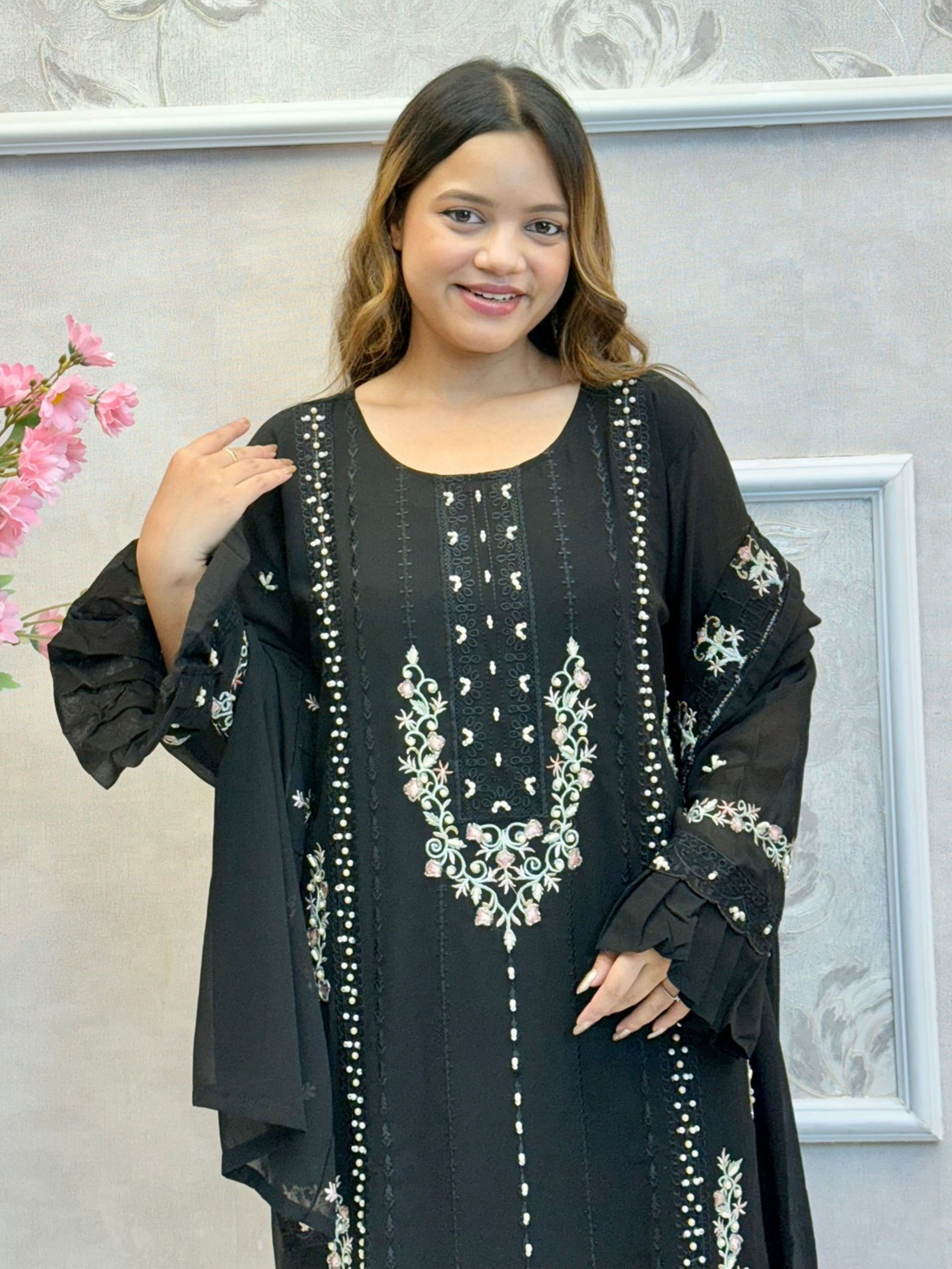 Black georgette suit with handwork detailing, satin pant, and embroidered dupatta – festive and stylish Indian ethnic outfit