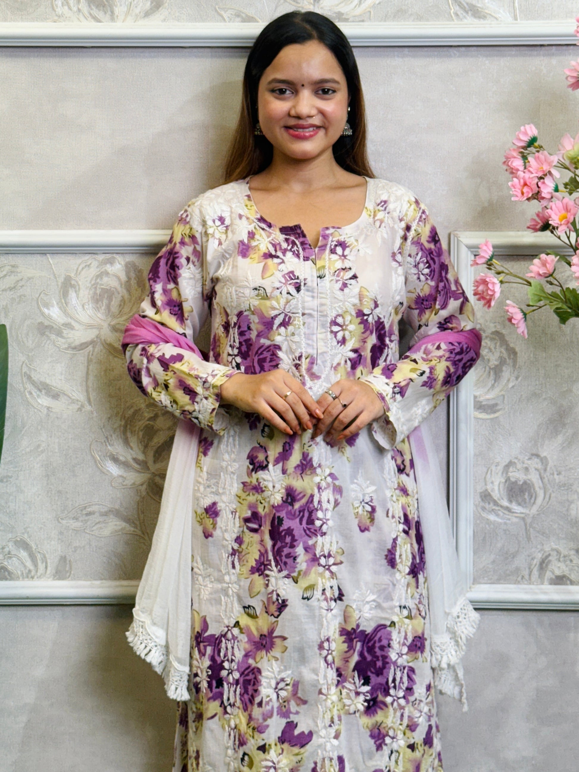 Lucknow Chikankari purple floral printed mulmul kurta palazzo set with chiffon dupatta and hand embroidery.
