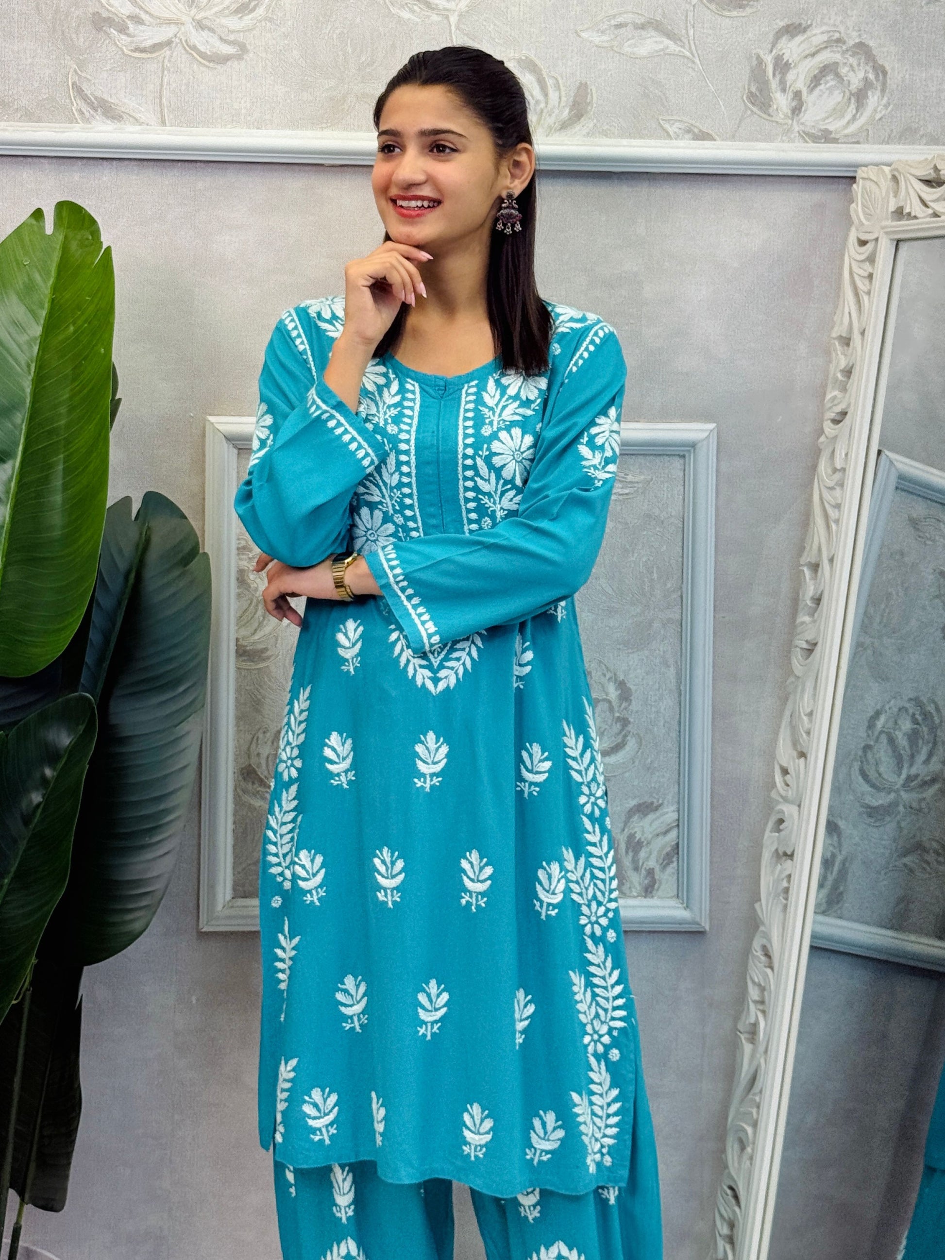 Turquoise rayon chikankari kurta and Afghani pant set with white hand embroidery