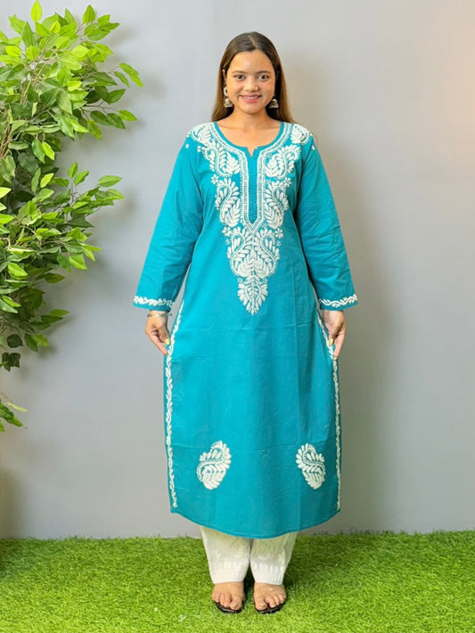 Model in teal blue cotton Chikankari kurta with white thread embroidery