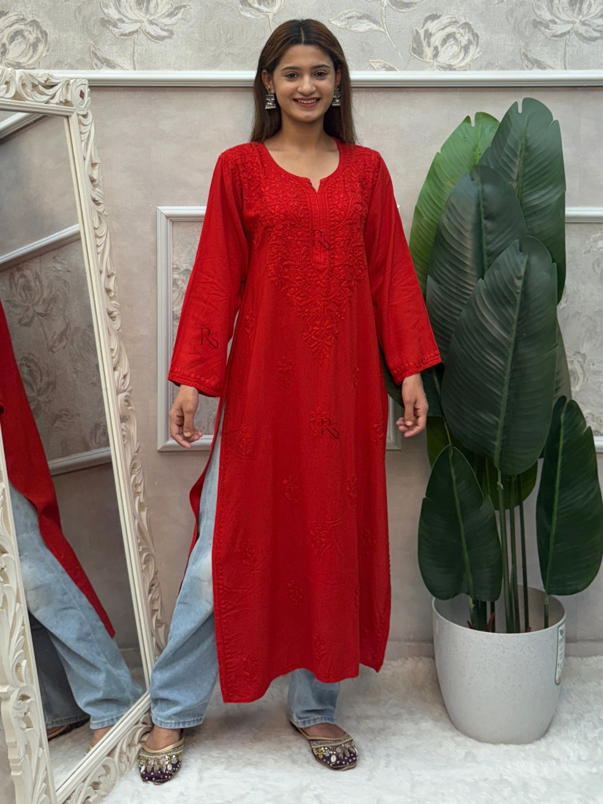 Red rayon Lucknow Chikankari kurta with intricate hand embroidery.