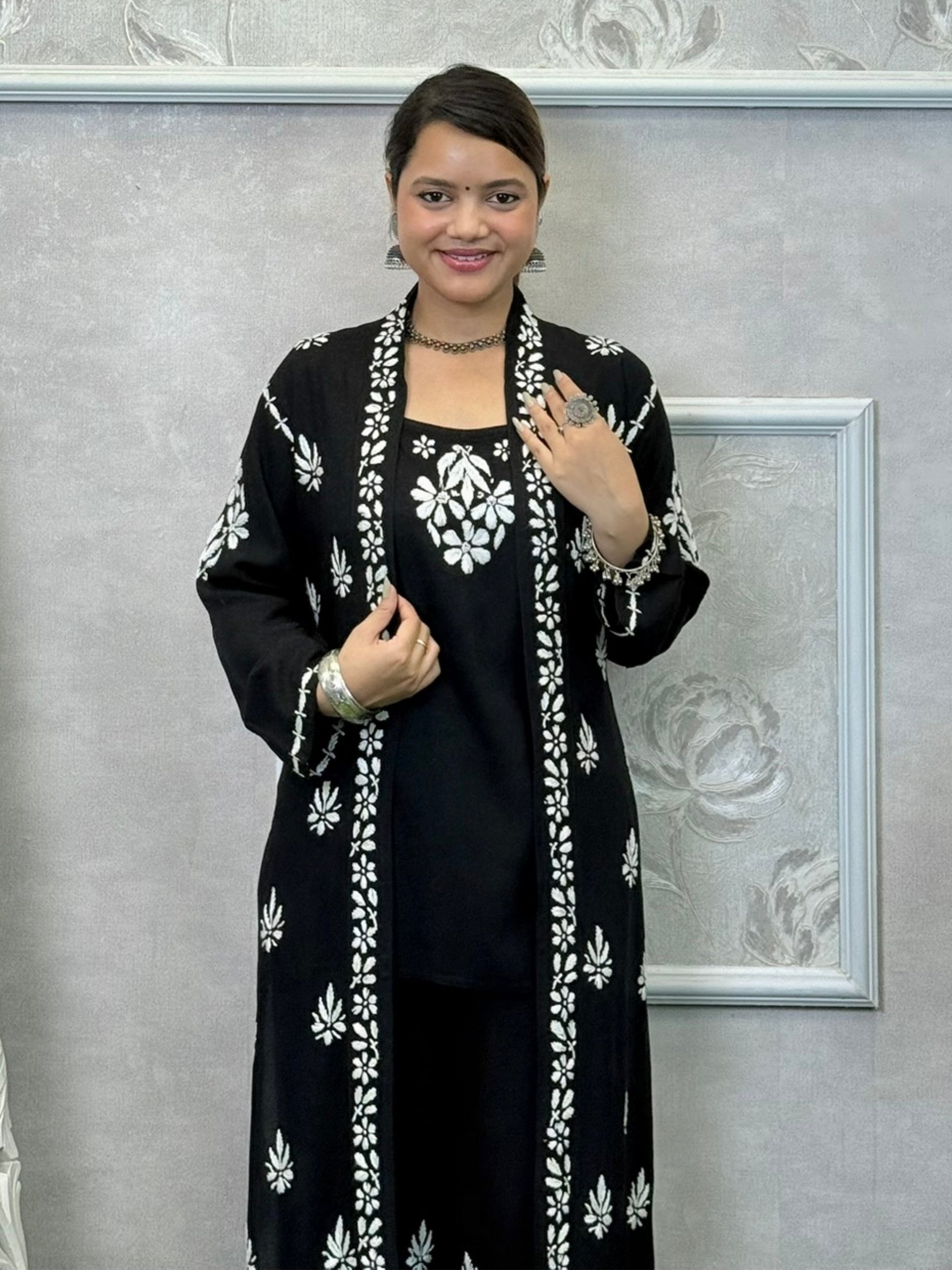 Black Lucknowi Chikankari 3-piece rayon set with sleeveless kurta, embroidered shrug, and pant