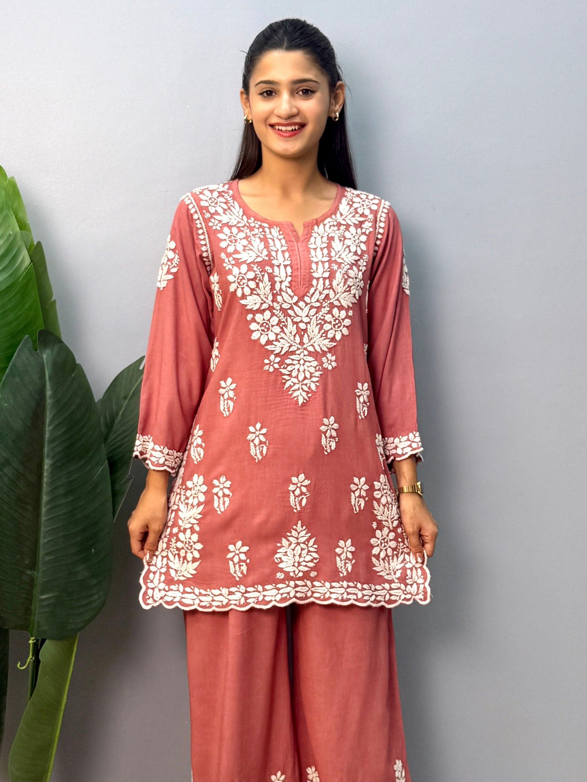 Dusty Rose Lucknow Chikankari rayon short kurta with palazzo pant featuring white hand embroidery.