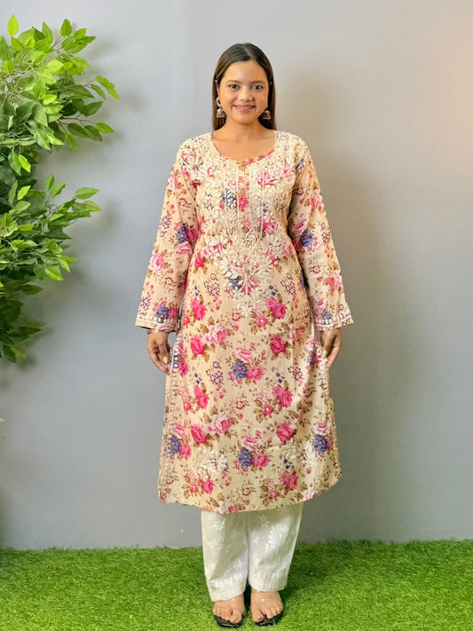 Woman in beige floral printed mulmul cotton chikankari kurta with white embroidery