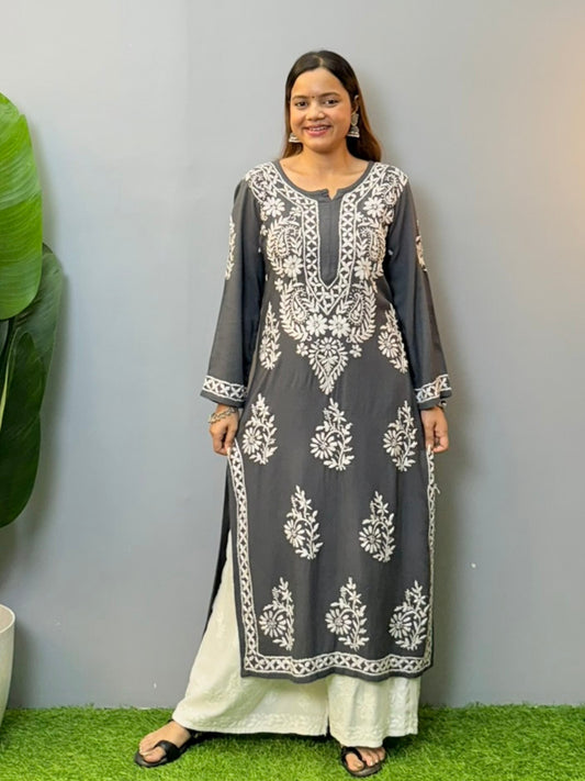 Woman wearing charcoal grey rayon chikankari kurta with white hand embroidery