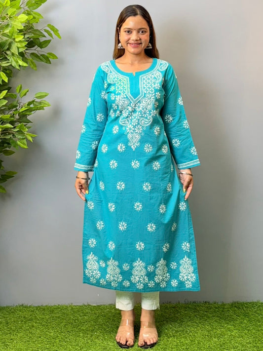 Woman in turquoise blue cotton chikankari kurta with white embroidery