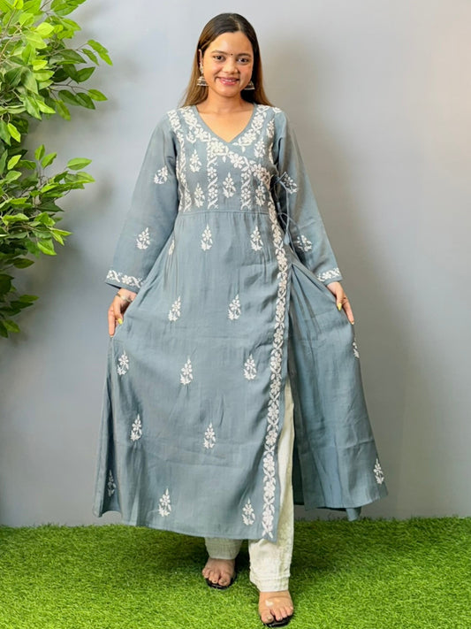 Model wearing grey angrakha-style Chikankari kurta with white hand embroidery