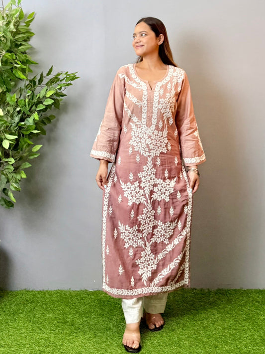 Model in dusty rose Chanderi Lucknowi chikankari kurta featuring intricate 3D white hand embroidery