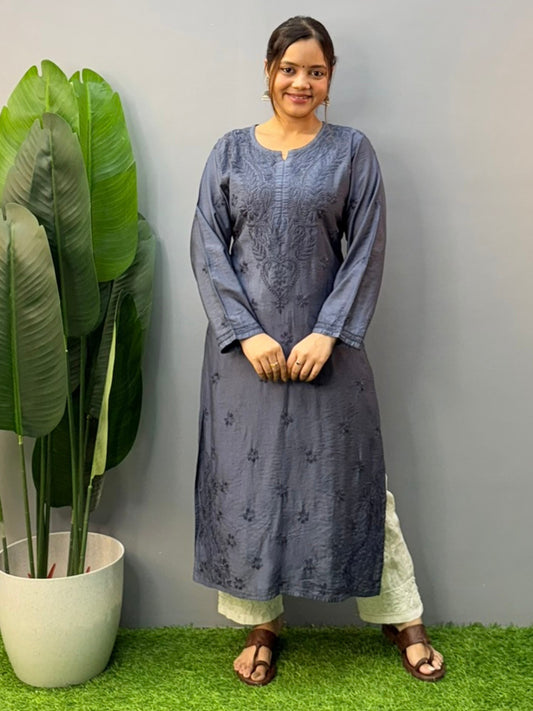Model wearing steel grey hand-embroidered Chanderi chikankari kurta with delicate motifs