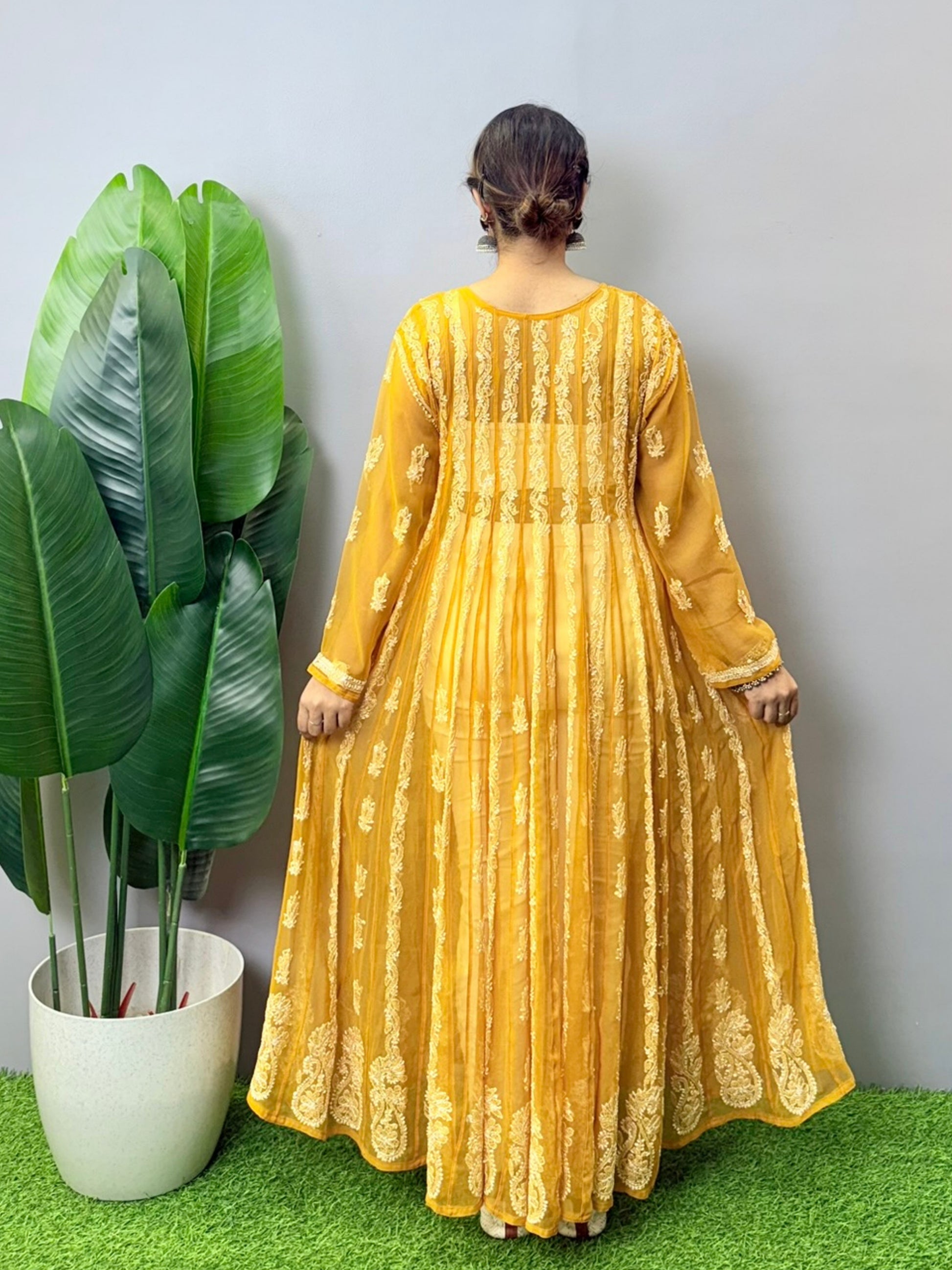Sunshine yellow georgette long frock with heavy flair and white Lucknowi Chikankari embroidery – festive ethnic wear