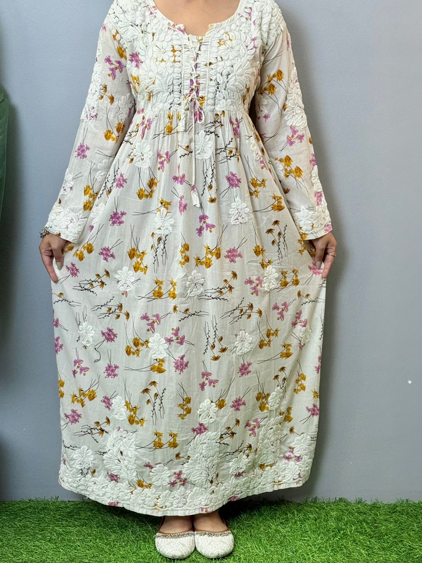 Floral printed mulmul Chikankari frock with 3D hand embroidery in off-white, pink, and yellow tones
