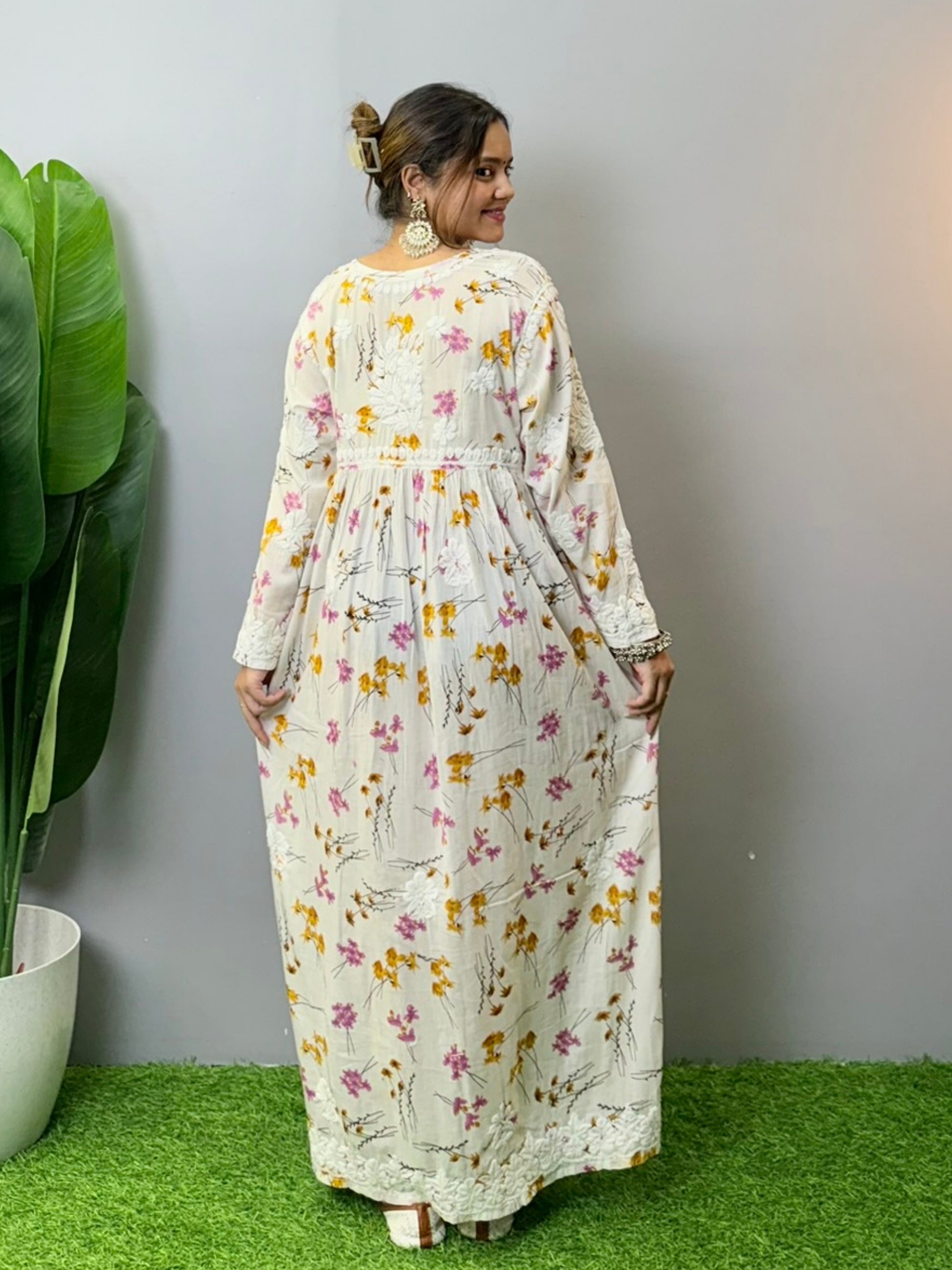 Floral printed mulmul Chikankari frock with 3D hand embroidery in off-white, pink, and yellow tones
